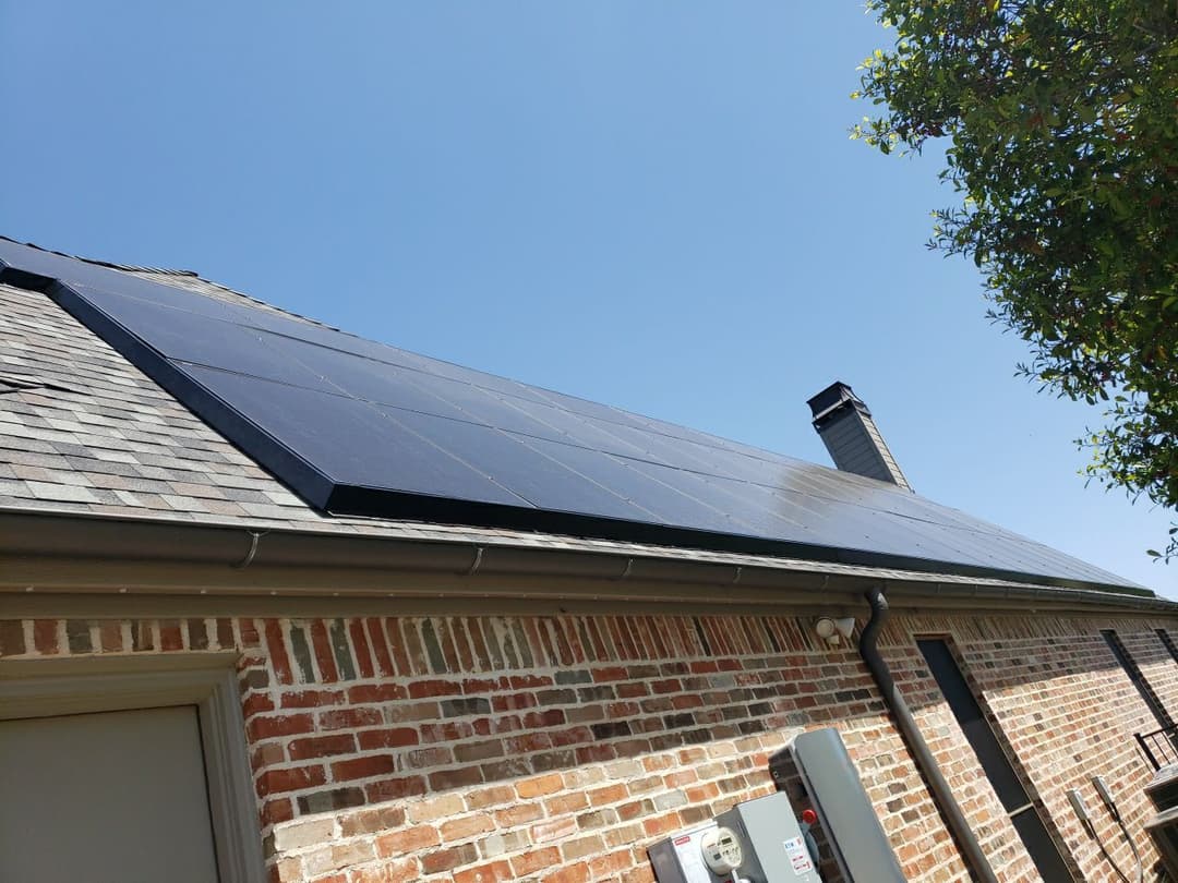 Solar panels installed on a roof, showcasing energy efficiency and sustainable living.