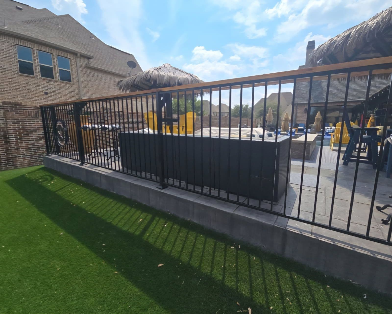 Stylish Iron Fence Bar Area in Prosper Texas image