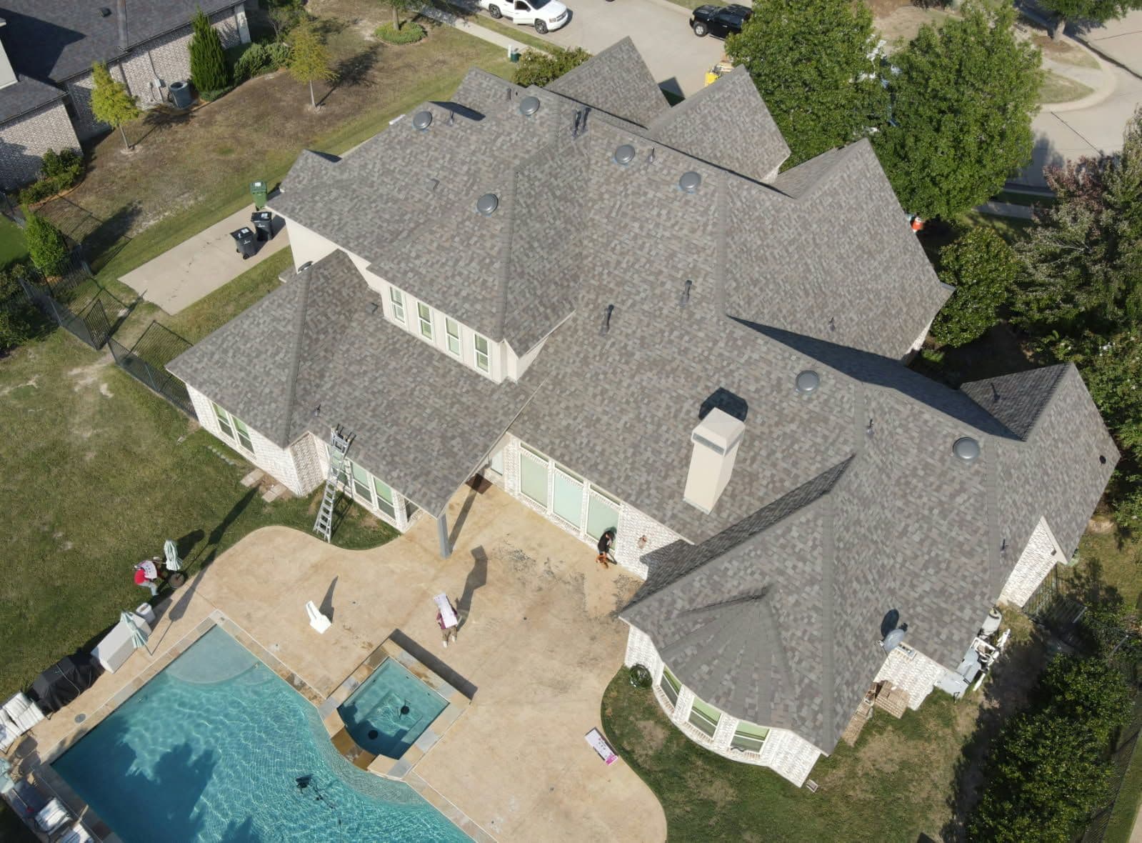 Stunning Roof Renovation Overlooks Scenic Backyard Retreat image